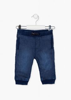 Pantalón vaquero con bolsillos en tejido de canalé para bebé niño